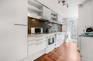 Kjøkken Tre roms leilighet Christianshavn. Bilde.