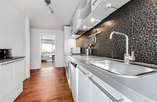 Kjøkken Tre roms leilighet Christianshavn. Bilde.