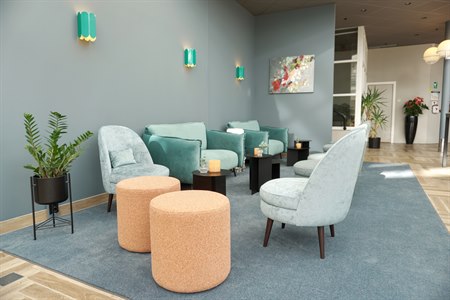 Fin lobby First Hotel Jönpöing. Bilde.