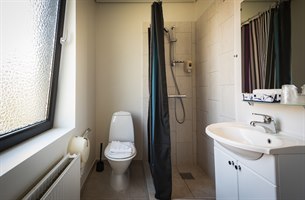 Bad enkeltrom type Prinsen hotell. Bilde.
