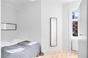 Treroms leilighet Frederiksberg. Bilde.