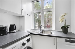 Kjøkken Toromsleilighet Norrebro. Bilde.