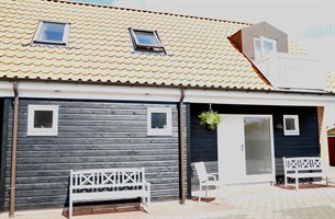 Utsiktbildet av familierom 4 personer. Bilde.
